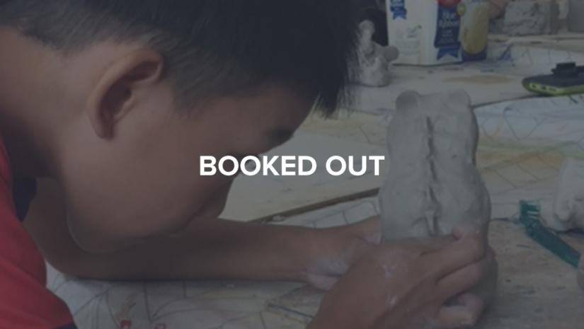 child with clay