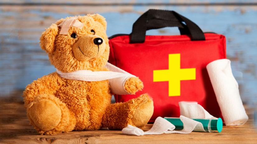 Teddy bear and first aid kit