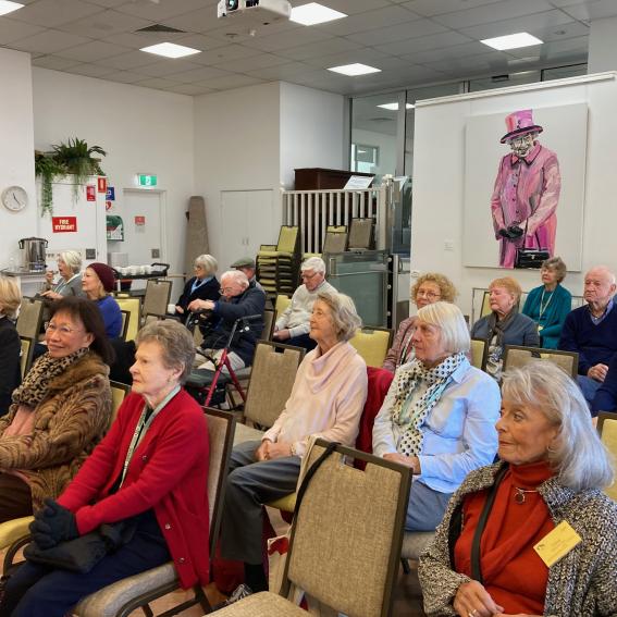 A group enthralled by one of our presentations