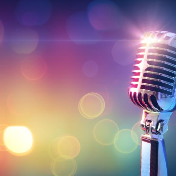 vintage microphone with a background of coloured lights