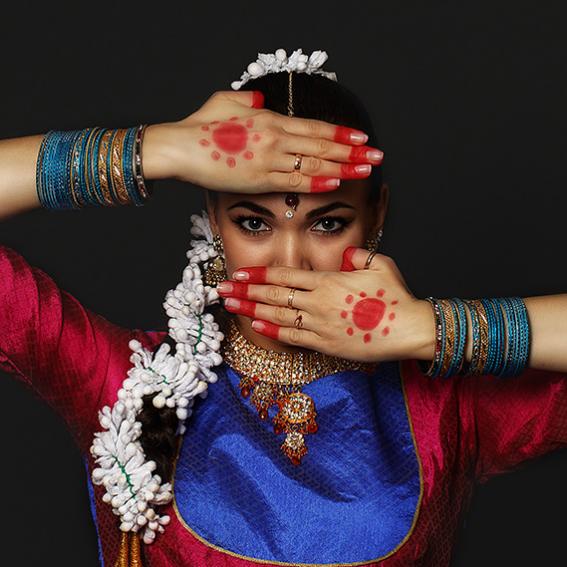 A female dancer in Bollywood attire