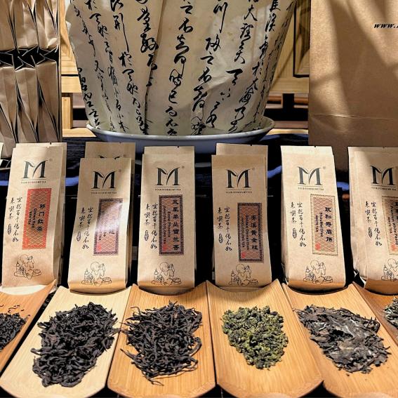 Chinese teas laid out on bamboo trays.