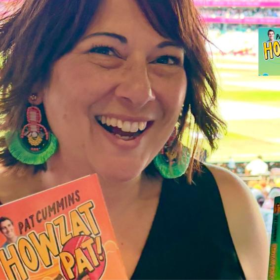 Serena Geddes holding two of her books.