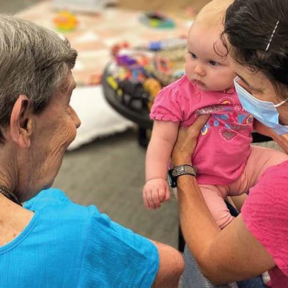 Older Australian with a baby and her mum