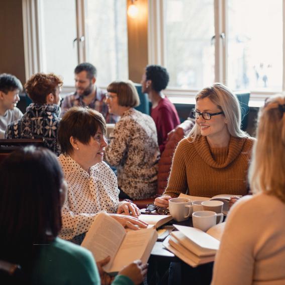 Two groups discussing books