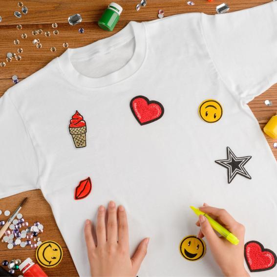 A white shirt with colourful decorations.