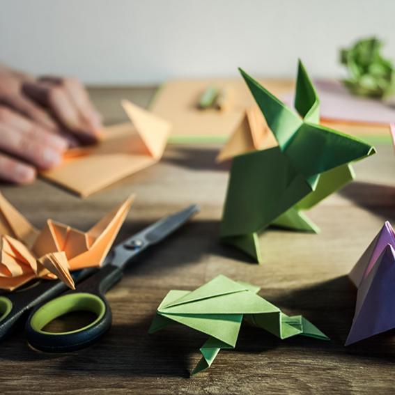 Origami figures on wooden table
