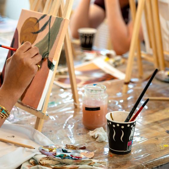 People painting on easels.