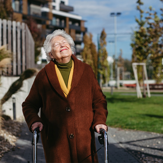 Senior lady going for a walk, feeling very happy