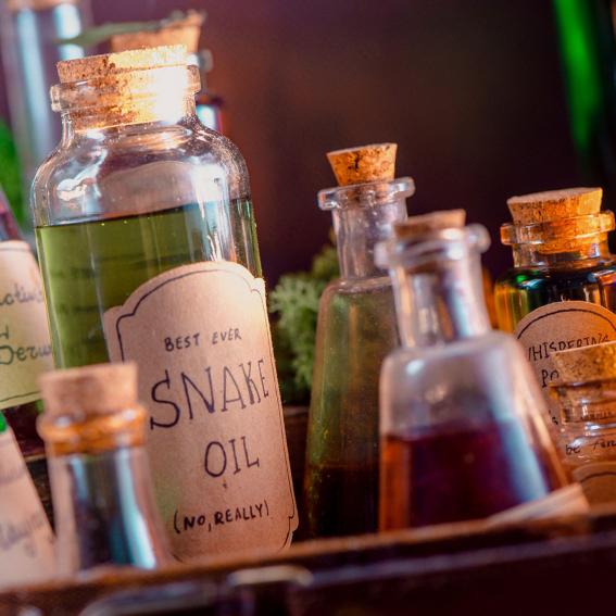 Bottles and potions labeled as snake oil.