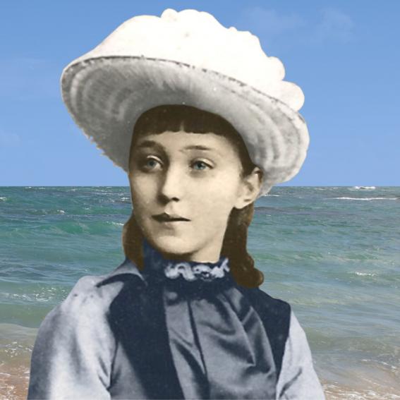 An image of a young Mathilde Plate with a beach background.