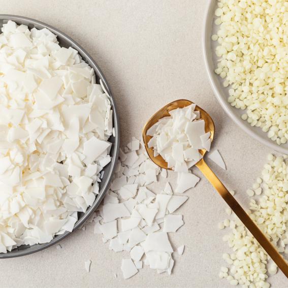 Wax shavings on a white table.
