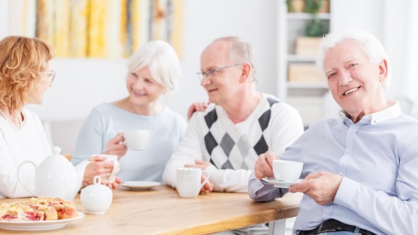 old people sitting at a table