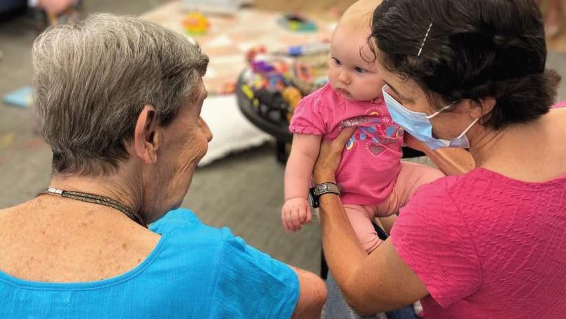 Older Australian with a baby and her mum