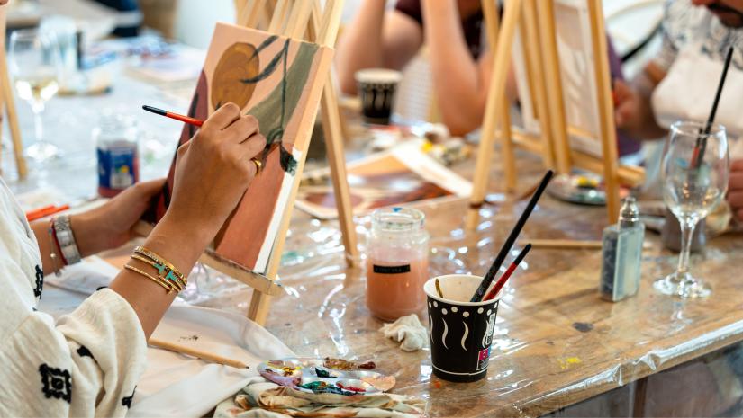 People painting on easels.