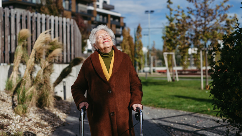Senior lady going for a walk, feeling very happy