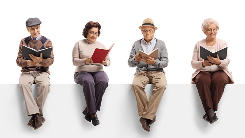 Mature male and female play reading