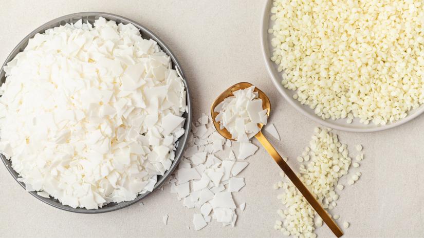 Wax shavings on a white table.